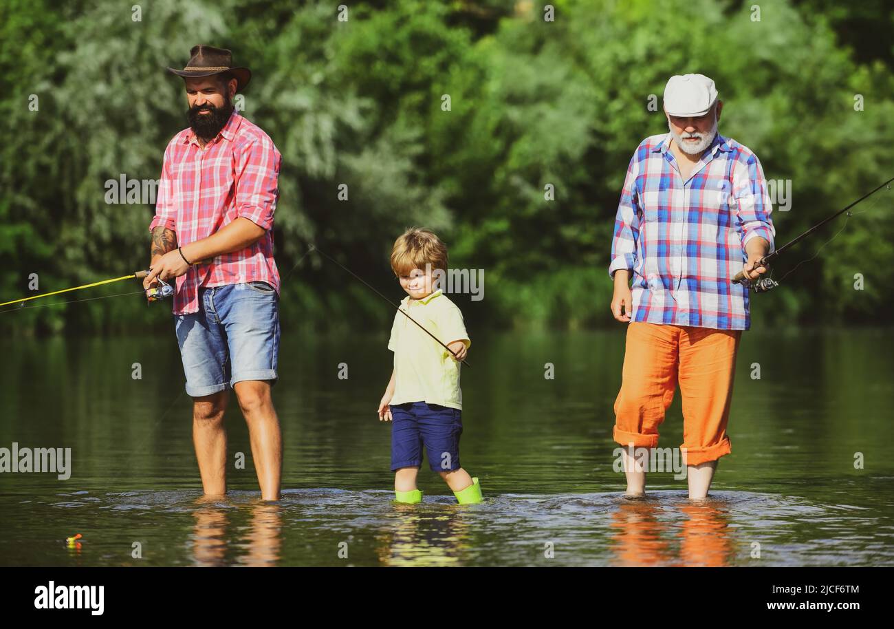 https://c8.alamy.com/comp/2JCF6TM/boy-with-father-and-grandfather-fly-fishing-outdoor-over-river-background-fishing-became-a-popular-recreational-activity-2JCF6TM.jpg