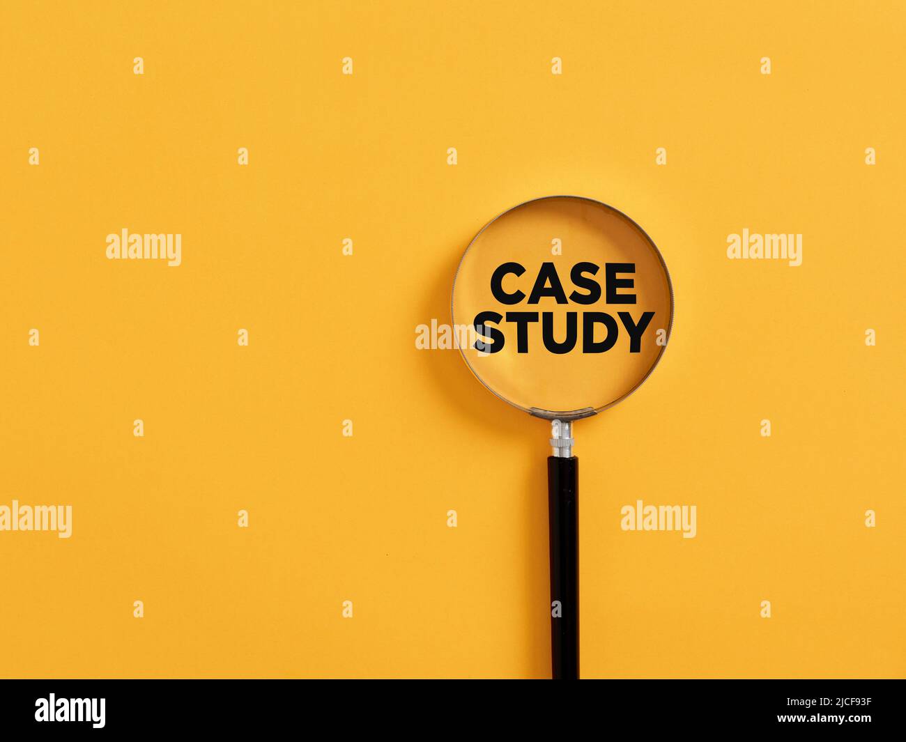 Magnifier focuses on the word case study. Education concept. Stock Photo