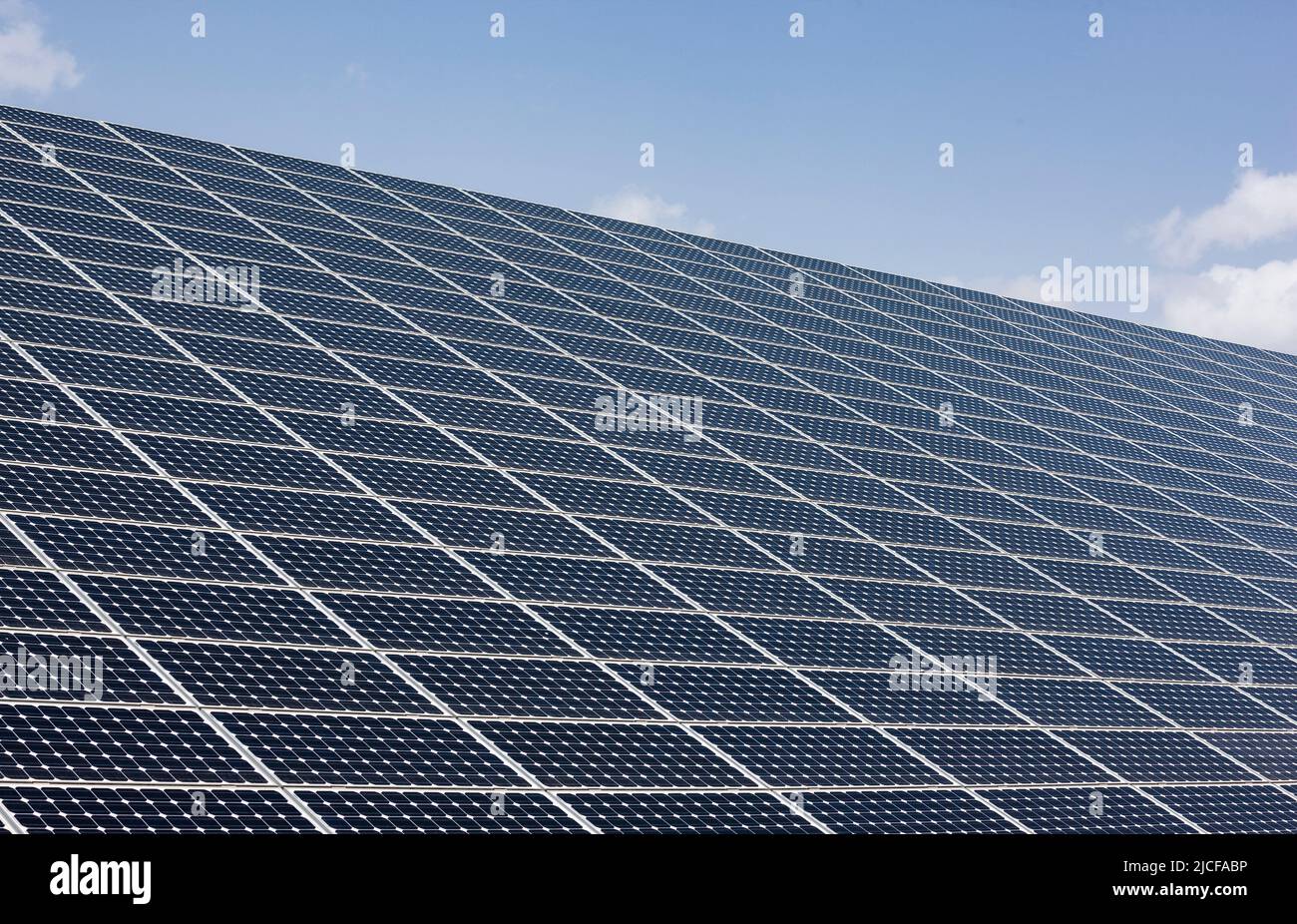 Solar panels against blue sky Stock Photo