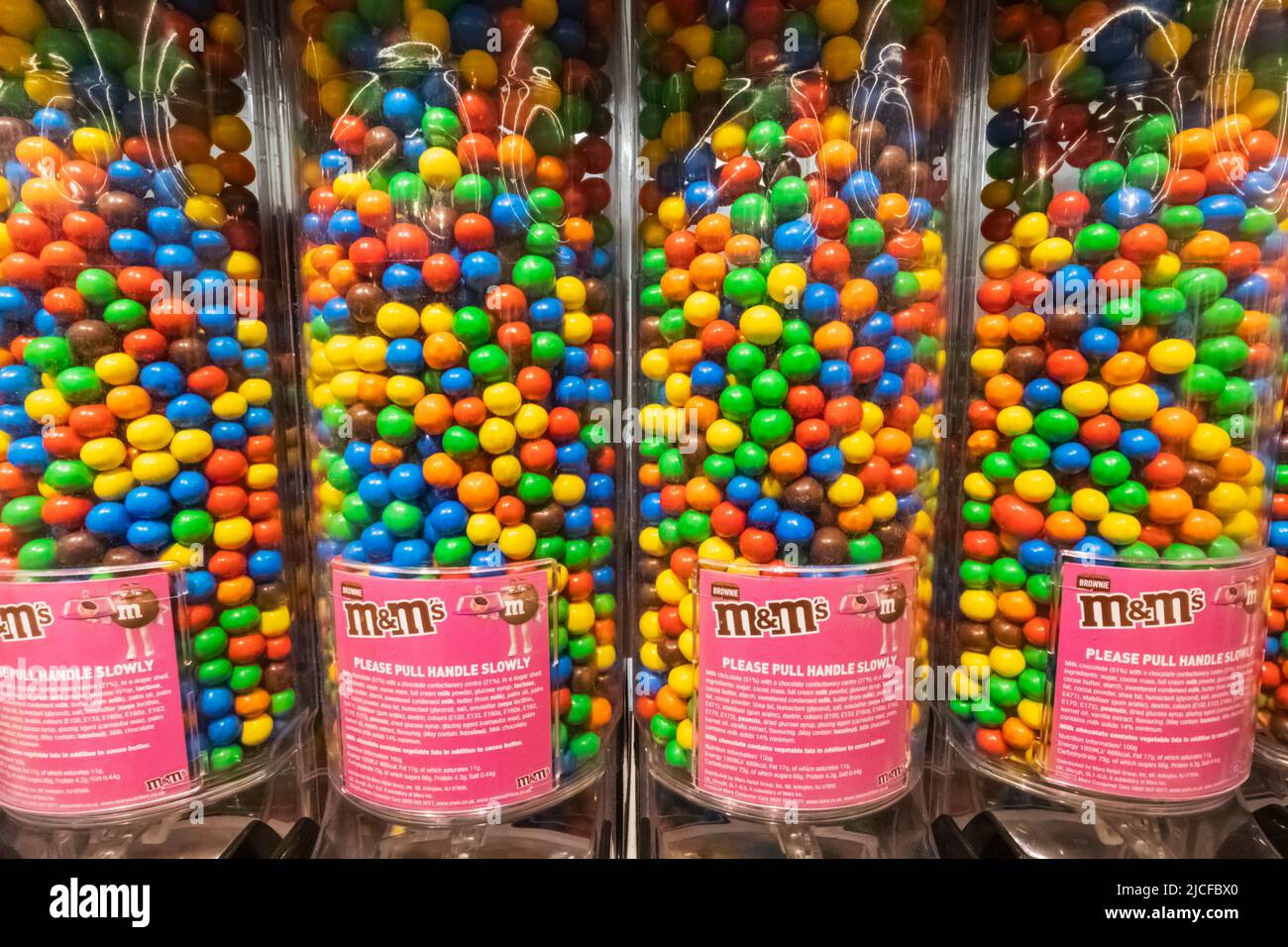 England, London, Leicester Square, M&M's World Store, M&M Colourful Self Service Dispensers Stock Photo