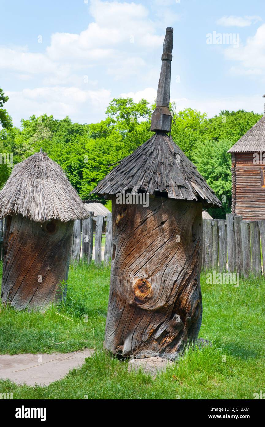 Ancient beehives in the field. Ukrainian landmark Stock Photo