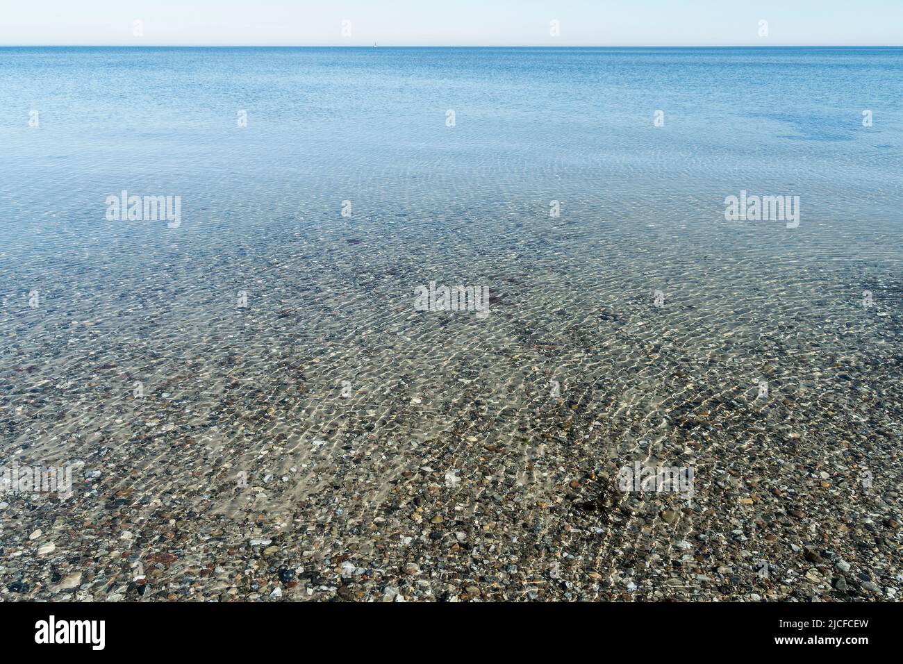 Schleswig-Holstein, mouth of the river Schleim, coast near Maasholm, pebble beach, reflections Stock Photo