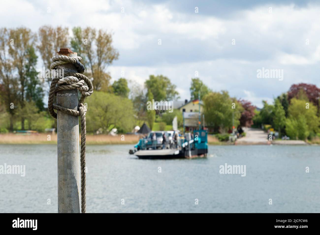Germany, Schleswig-Holstein, Schlei Nature Park, Arnis, ferry crossing, dolphin with rope Stock Photo