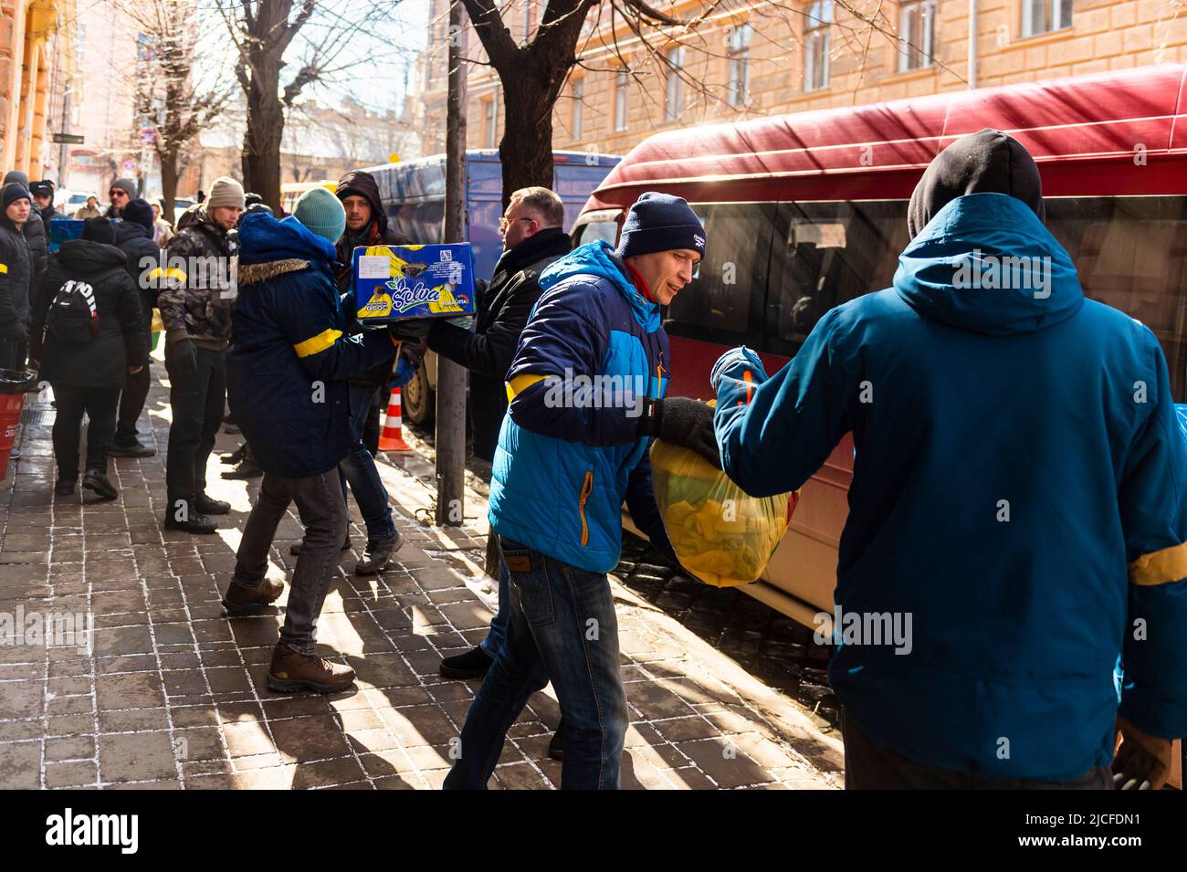 Helpers pack relief supplies and food into shelters. The city is preparing for war here as well. Stock Photo
