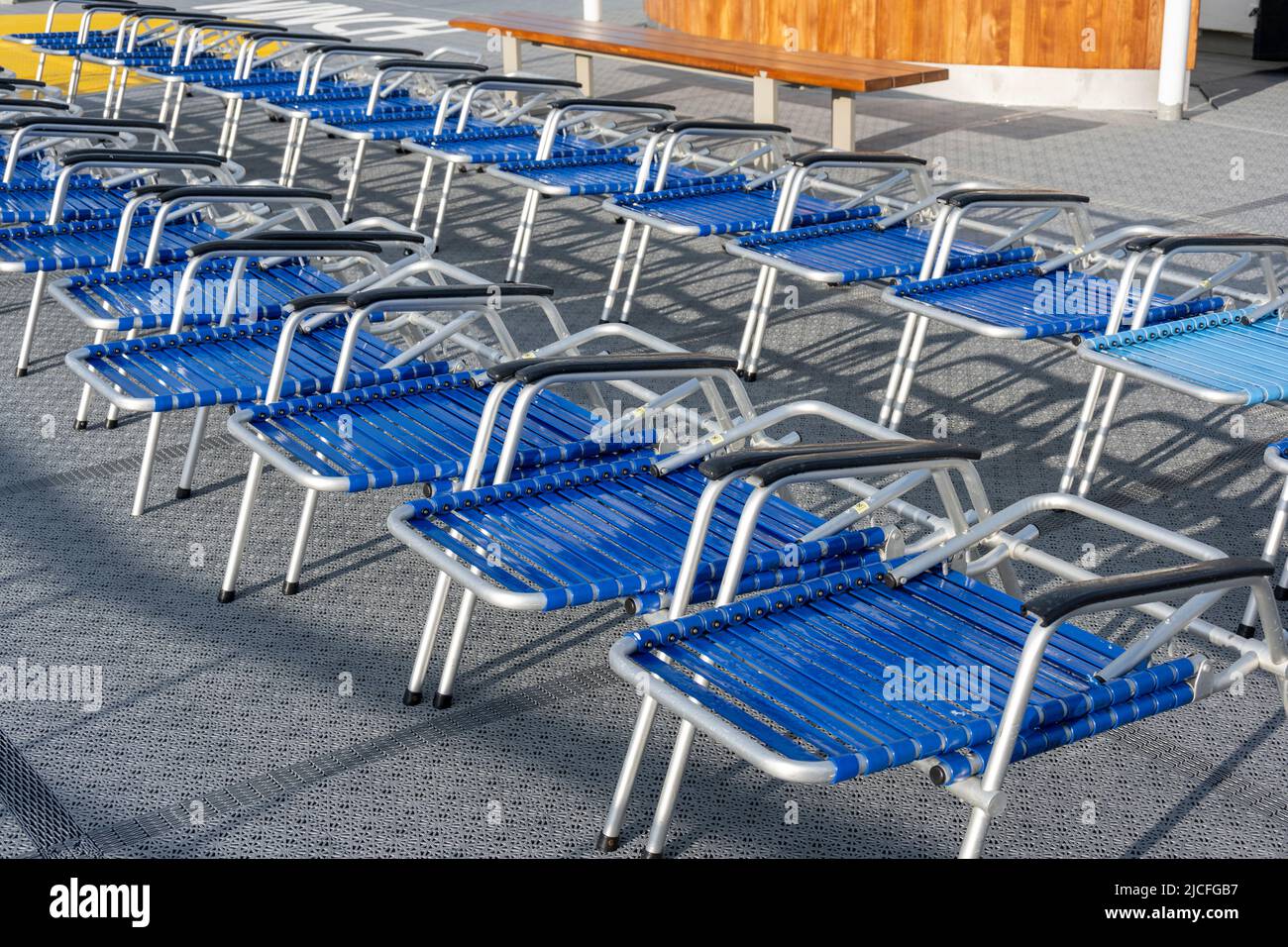 Deck chairs lined up on beach hi-res stock photography and images - Alamy