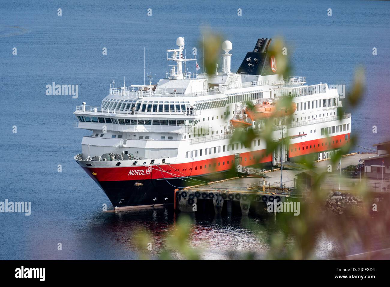 Norway, Troms og Finnmark, Kirkenes, The Hurtigruten ship 'Nordlys' in the harbor. Stock Photo