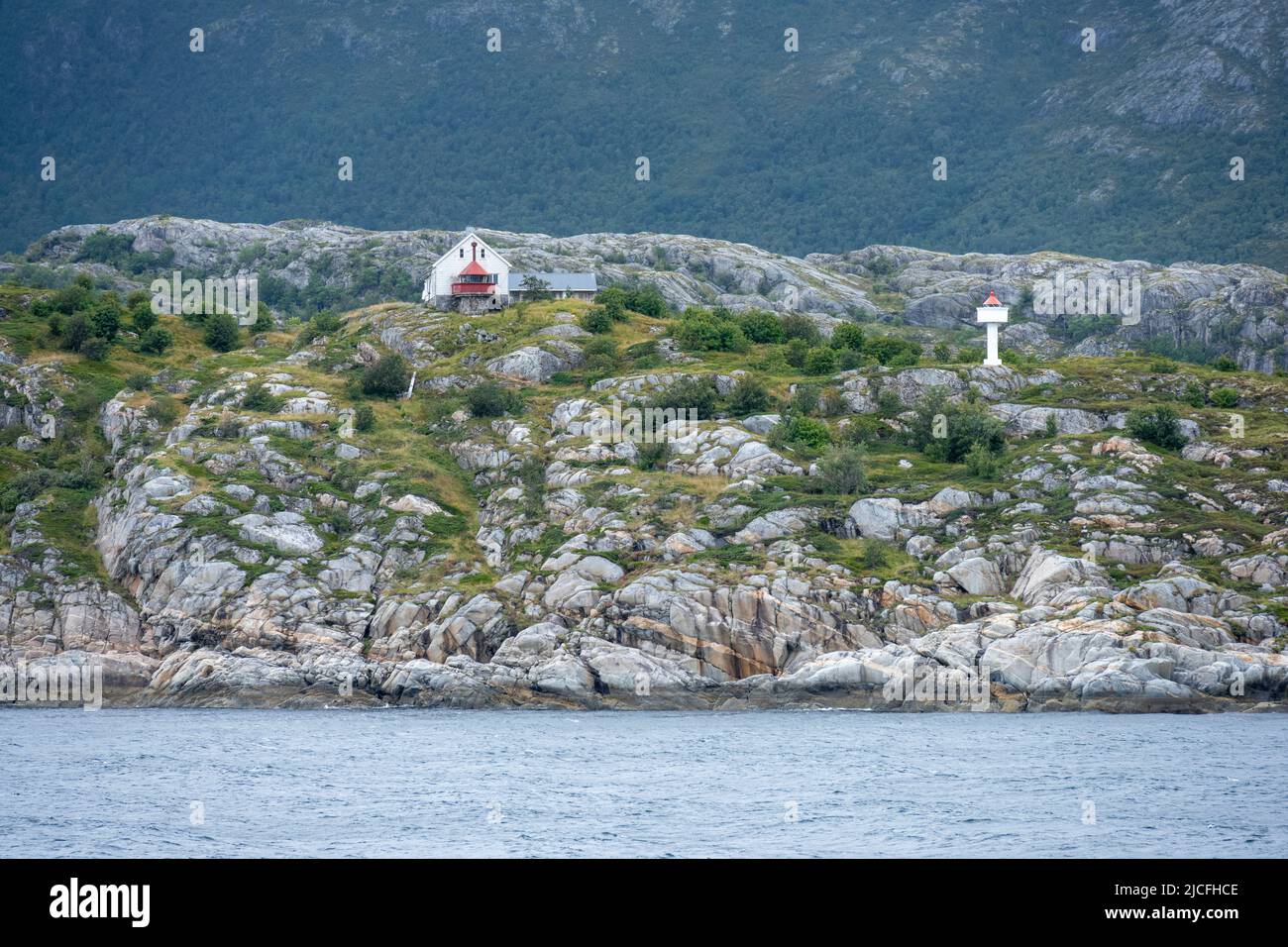Norway, Nordland, Bjørnøy lighthouse on the island Bjørnøya. Stock Photo