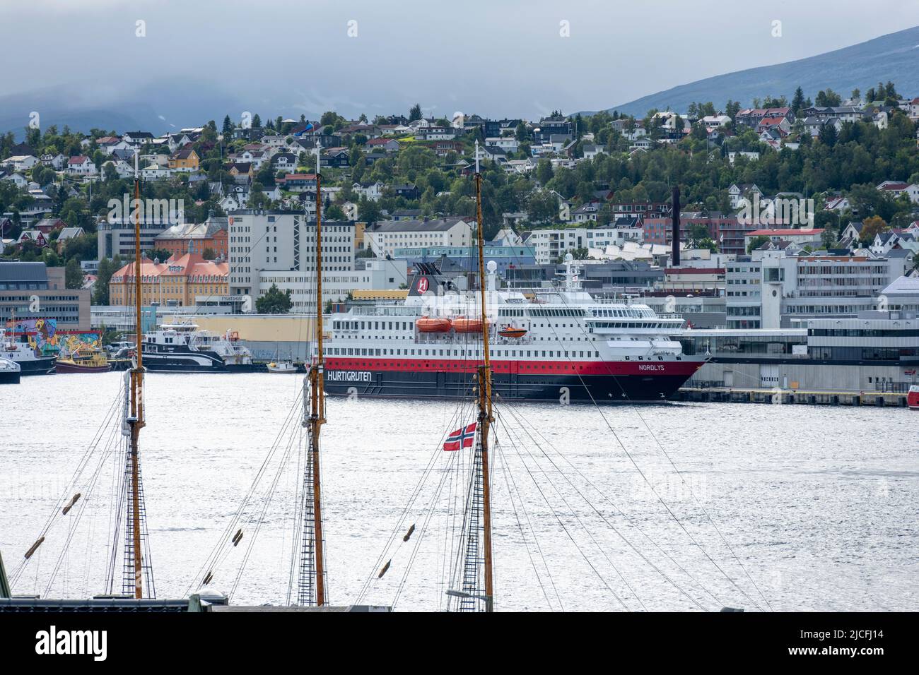 Norway, Troms og Finnmark, Tromsø, Hurtigruten mailboat 'Nordlys' in port. Stock Photo