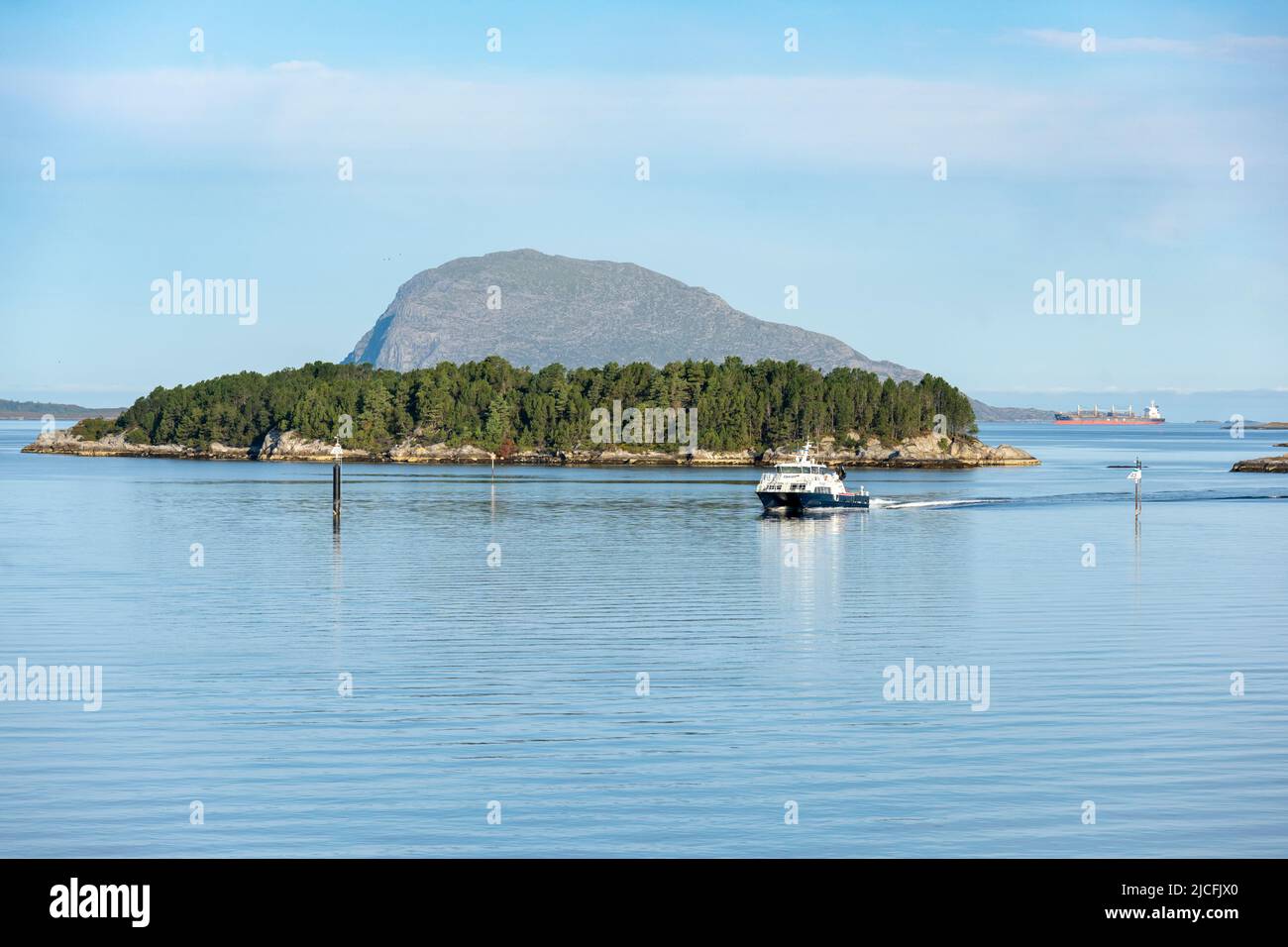 Norway, Vestland, Florø, small forested island in front of the city. Stock Photo