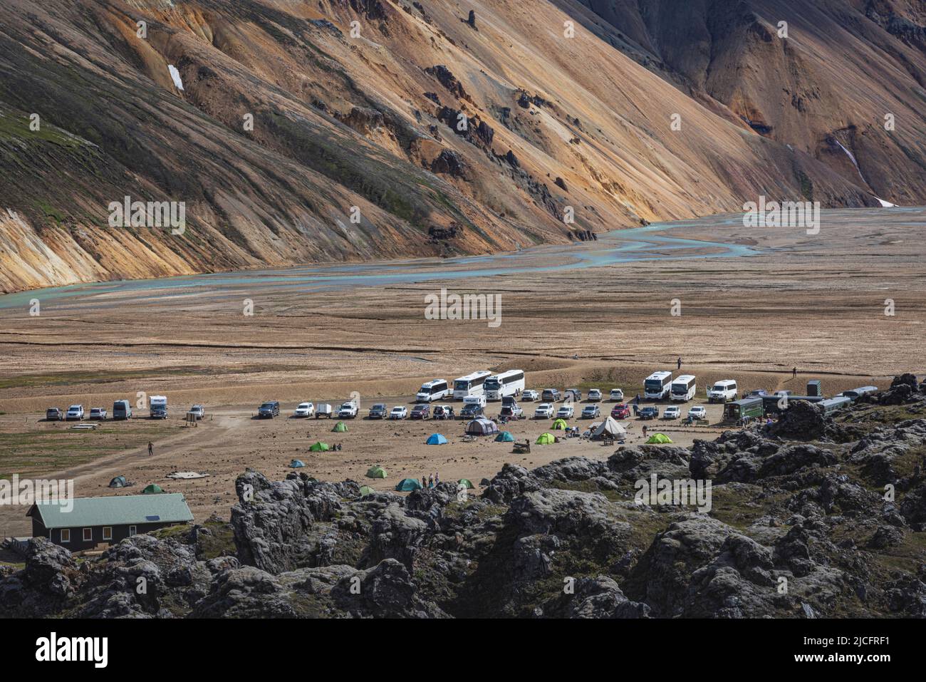 Laugavegur hiking trail is the most famous multi-day trekking tour in Iceland. Landscape shot from the area around Landmannalaugar, starting point of the long-distance hiking trail in the highlands of Iceland. Camping site. Stock Photo