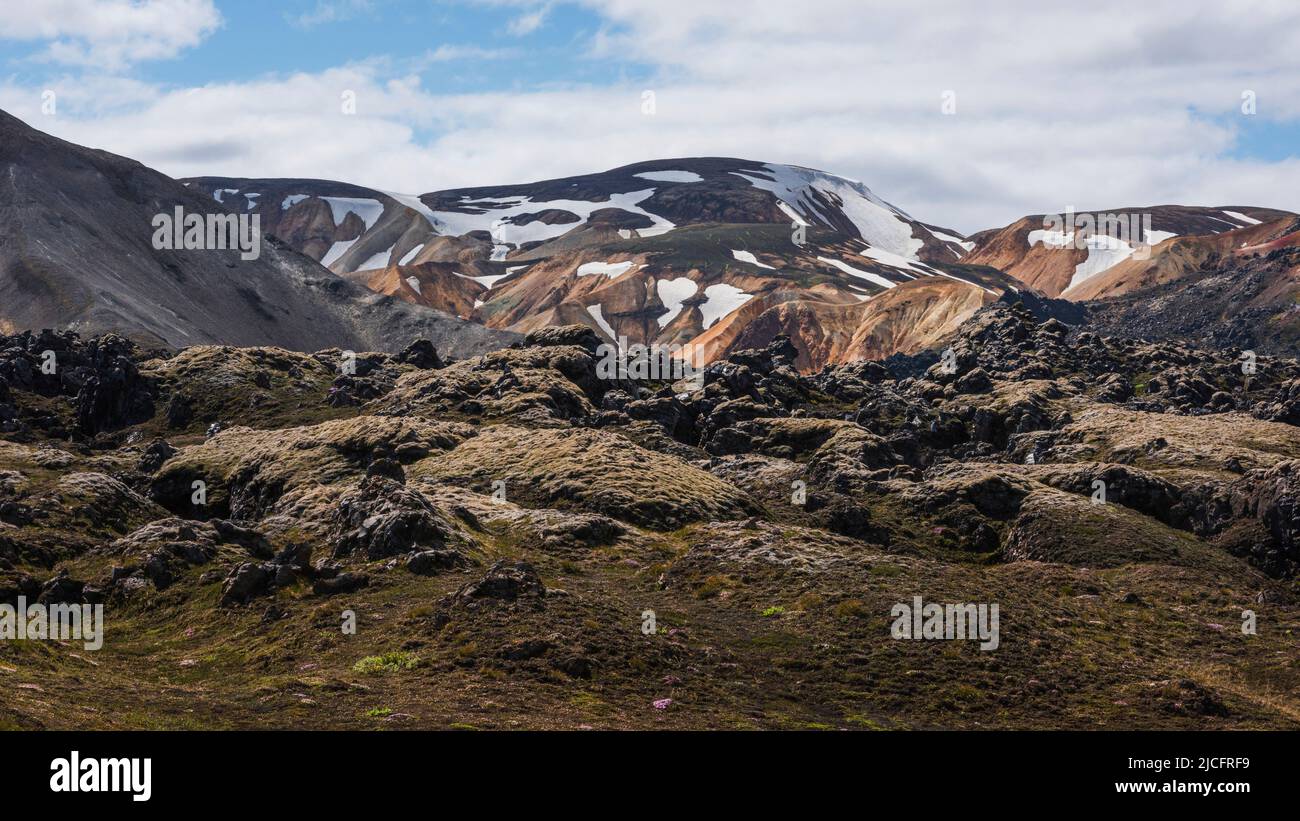 Laugavegur hiking trail is the most famous multi-day trekking tour in Iceland. Landscape photo from the area around Landmannalaugar, starting point of the long-distance hiking trail in the highlands of Iceland near the volcano Hekla. Stock Photo