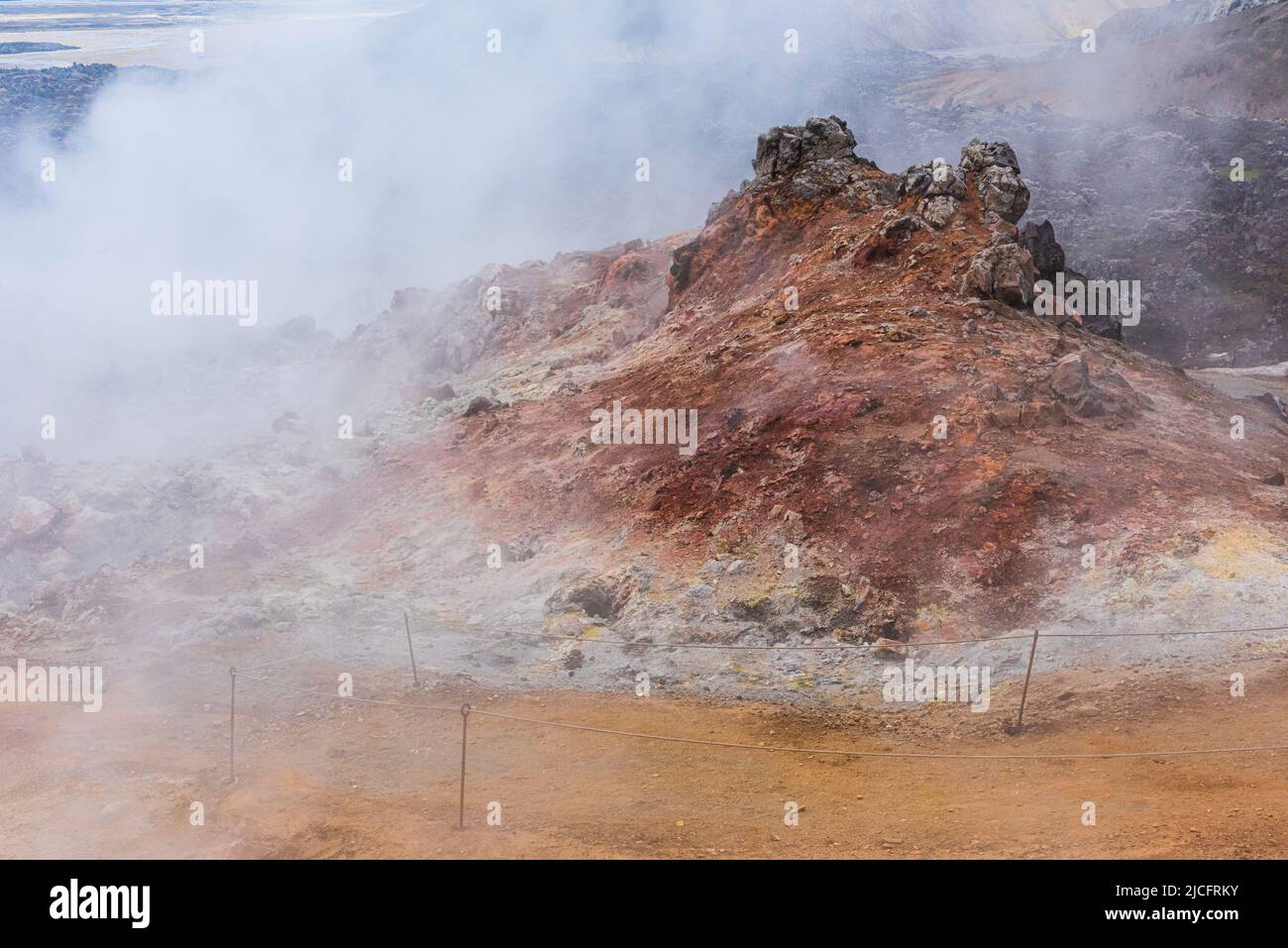 Laugavegur hiking trail is the most famous multi-day trekking tour in Iceland. Landscape photo from the area around Landmannalaugar, starting point of the long-distance hiking trail in the highlands of Iceland. Geothermal spring. Stock Photo