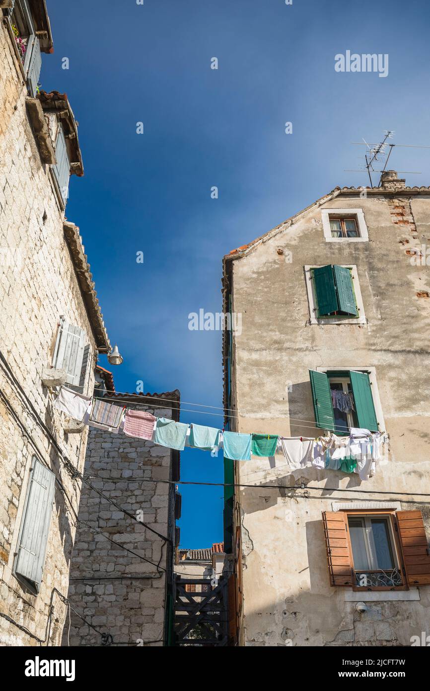 Houses with stretched clothesline in the old town of Split, Split-Dalmatia County, Dalmatia, Croatia, Europe Stock Photo