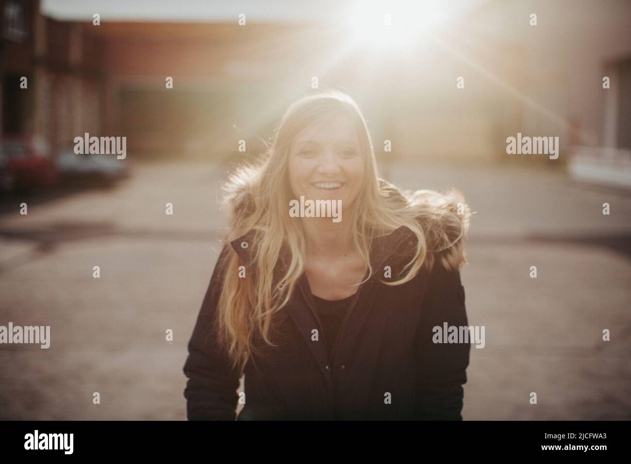 Happy young woman outside hi-res stock photography and images - Alamy