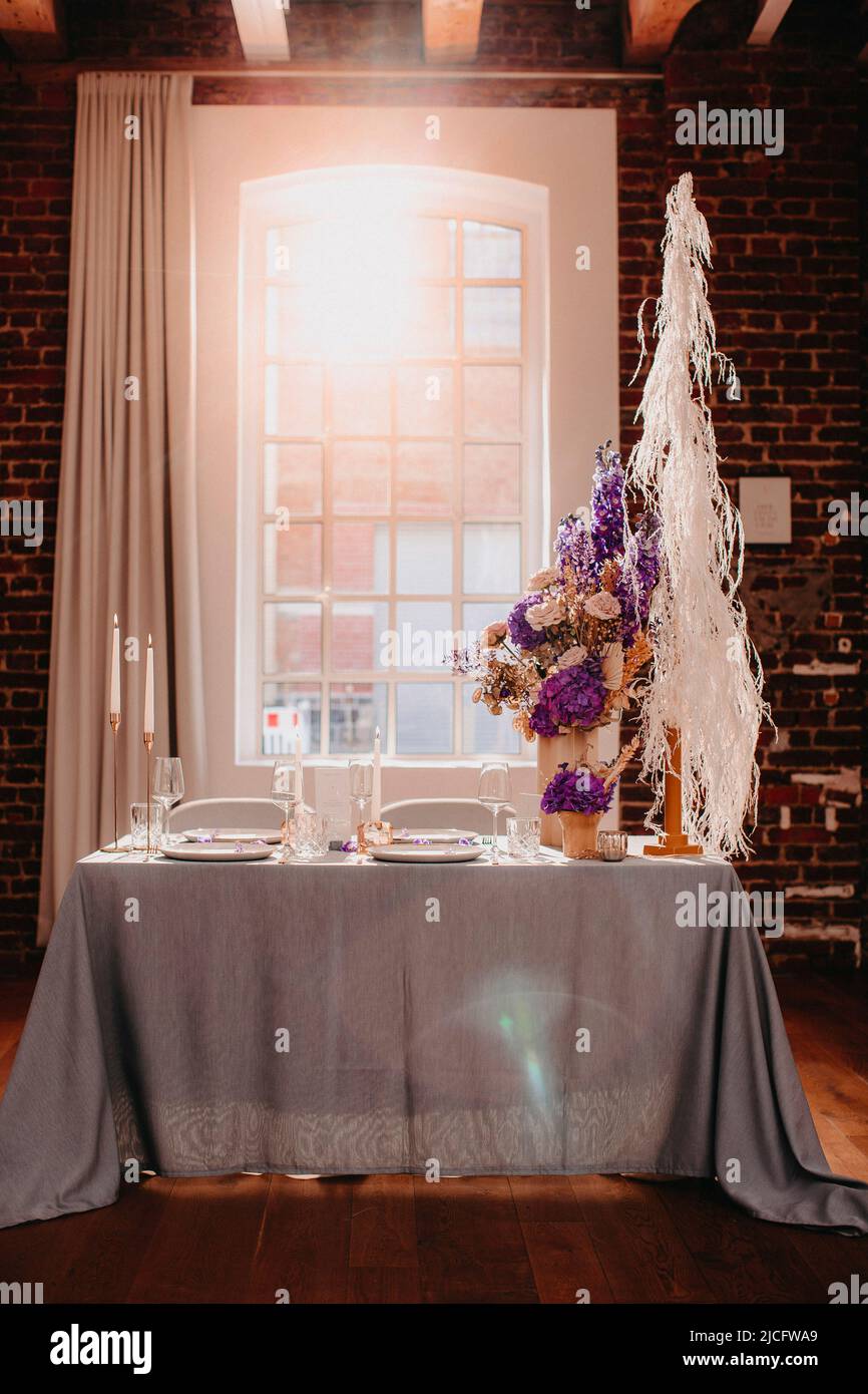 Festively set table with decoration Stock Photo