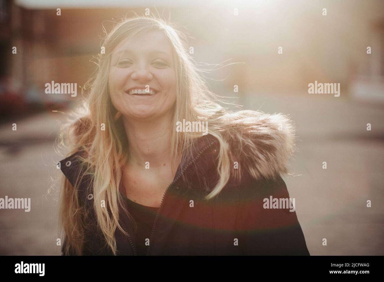 young woman, blonde, happy, laugh, outside, portrait Stock Photo