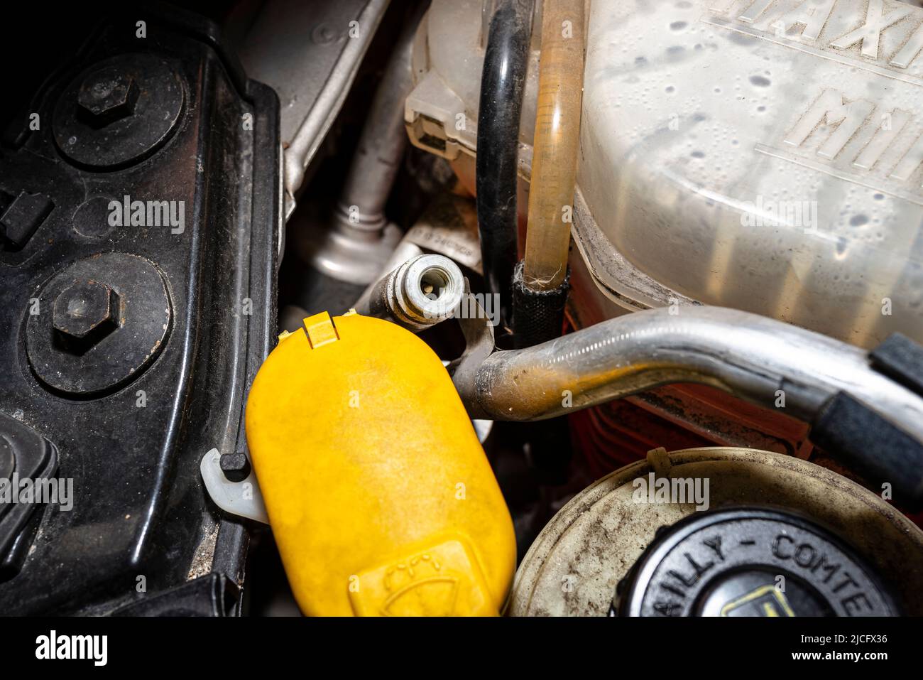 Open valves in passenger car air conditioning system for charging with