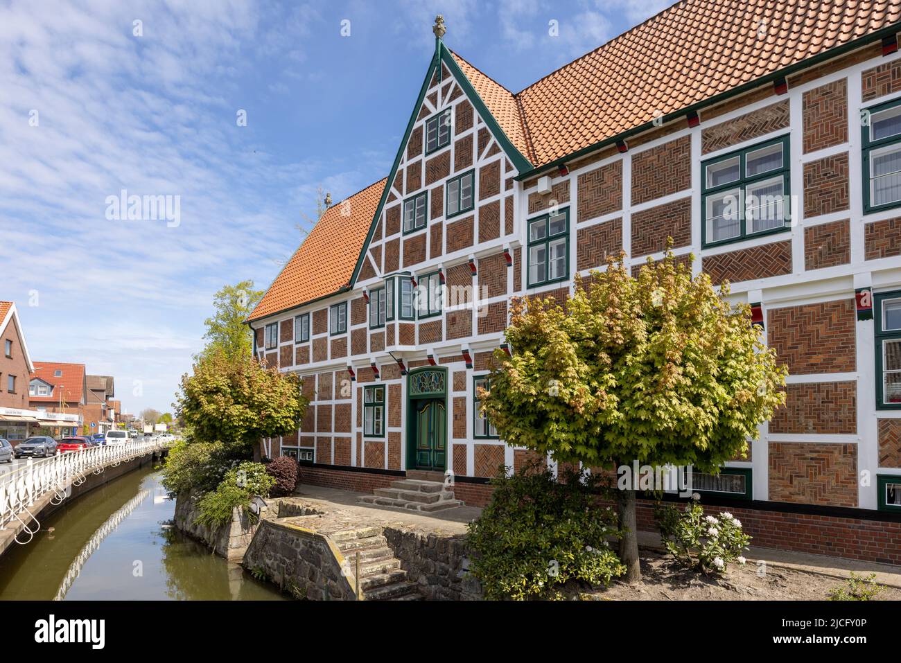 The town hall in Jork in the Alte Land in spring during apple blossom Stock Photo
