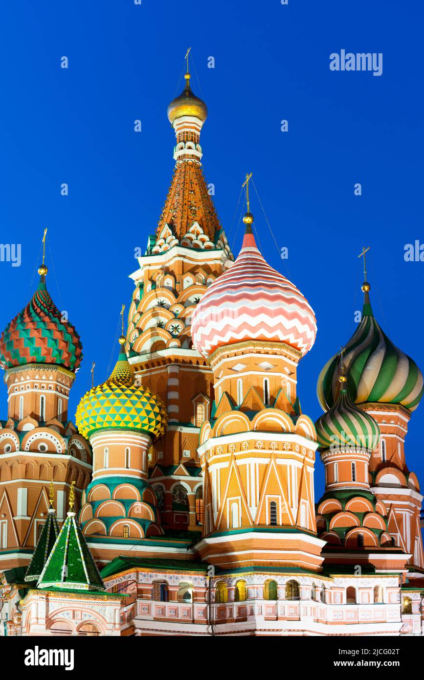Close-up of the domes of Saint Basil's Cathedral lit up at night ...
