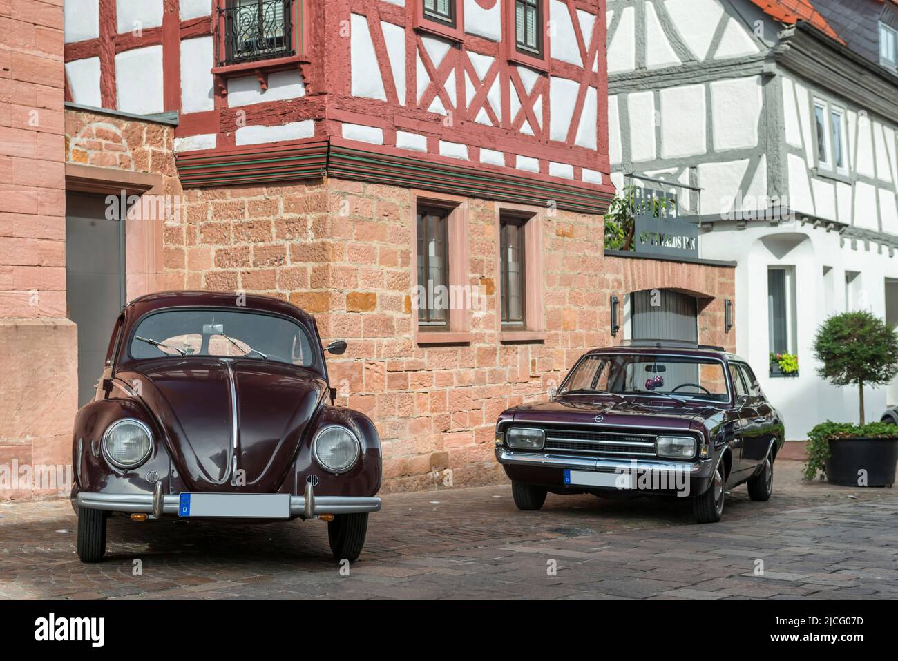 Obernburg, Bavaria, Germany, VW Beetle, year of construction 1948 in the background eon Opel Rekord C, year of construction 1969 Stock Photo