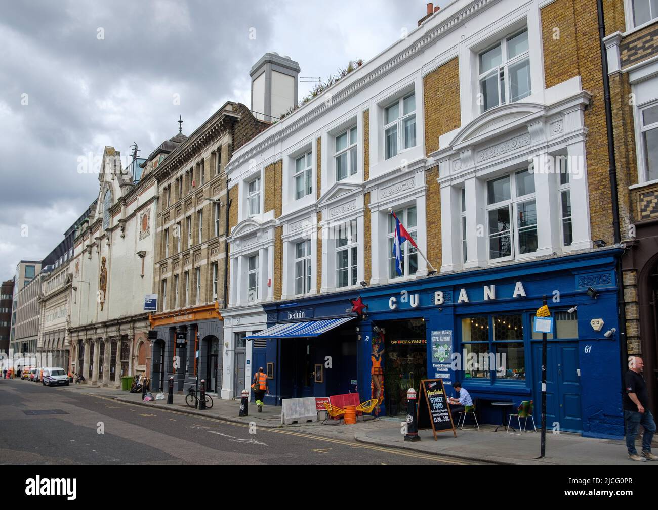 Charterhouse Street london street scene and Cubana bar restaurant Stock Photo