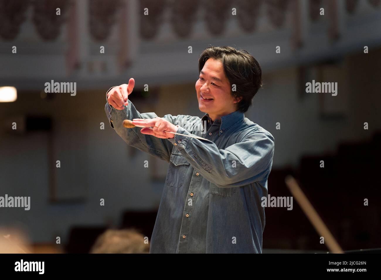 Japanese conductor Daisuke Muranaka conducting a rehearsal of the English Chamber Orchestra, before that nights concert.  Cadogan Hall, Sloane Terrace Stock Photo