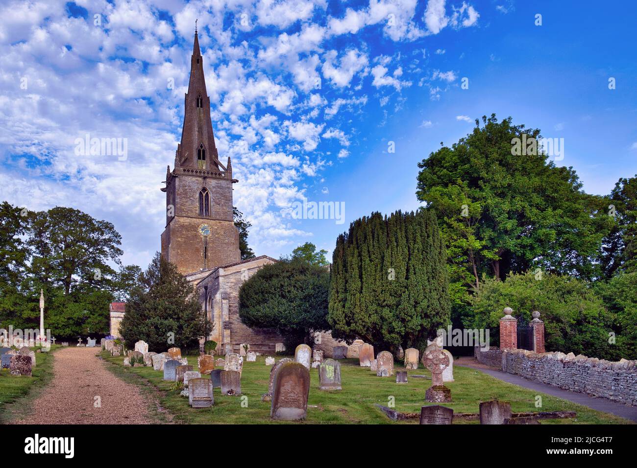 Vivid blue sky at St Peter's parish church in the village of Sharnbrook, Bedfordshire, England, UK Stock Photo