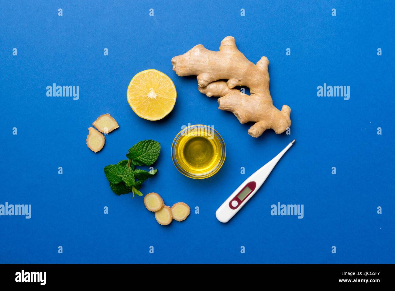 Natural cold and flu home remedies and thermometer. Natural ingredients