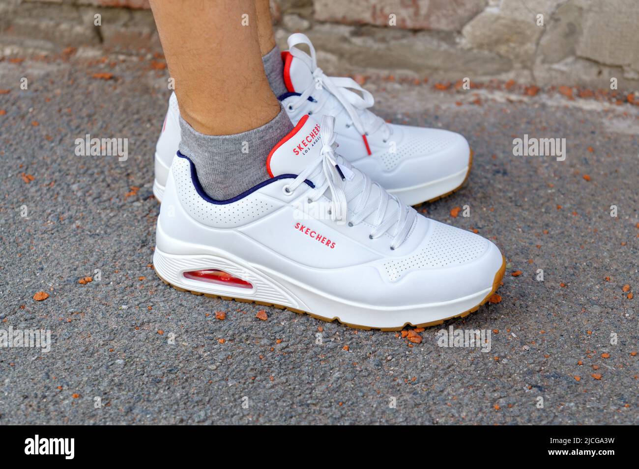 Tyumen, Russia-April 27, 2022: Skechers white sneakers logo trademark.  Headquartered in Manhattan Beach, California, the brand was founded in 1992  Stock Photo - Alamy