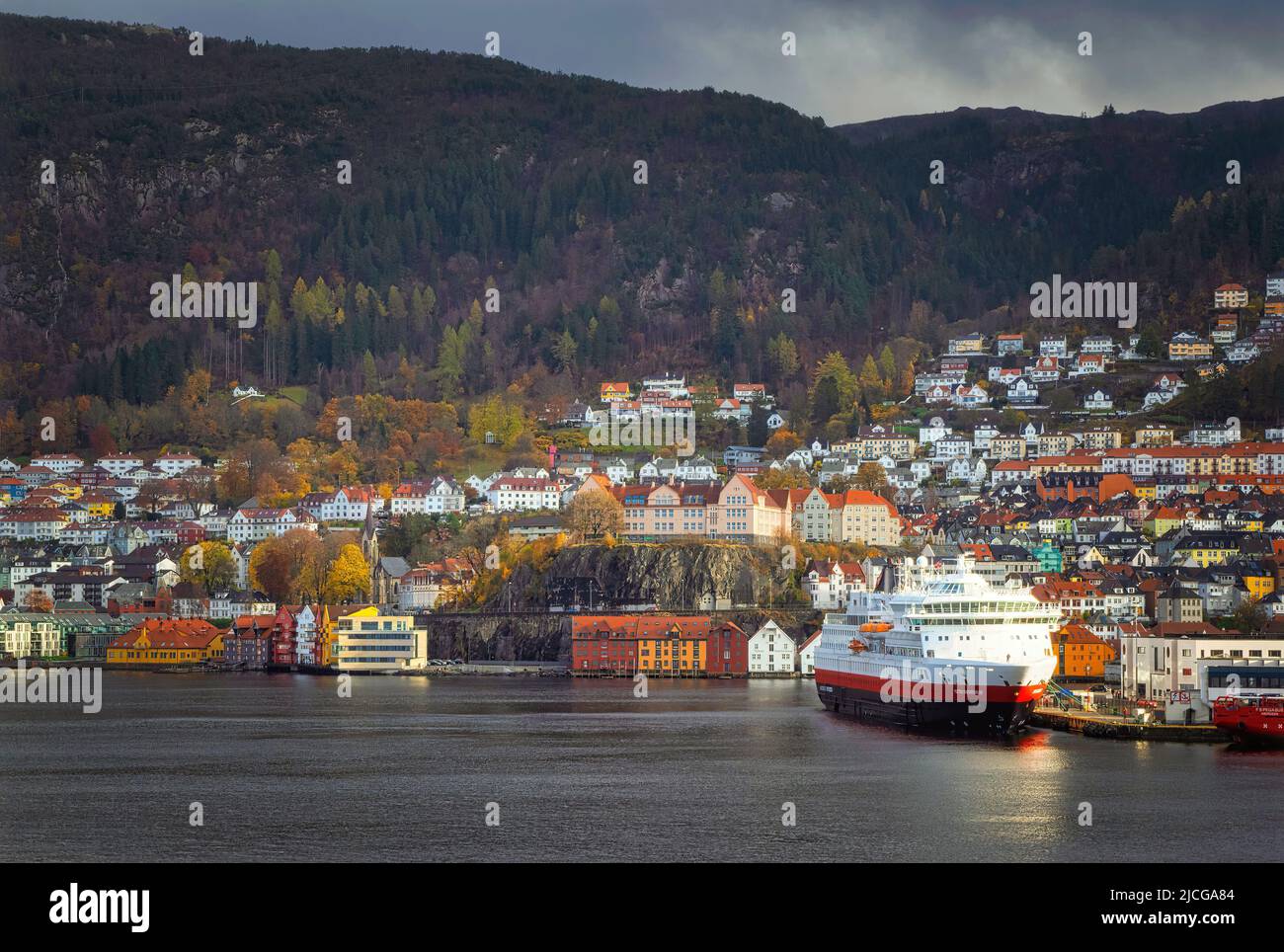 The Hurtigruten cruise ship MS Otto Sverdrup (formerly MS Finnmarken) docked in the colourful city of Bergen in Norway. Stock Photo