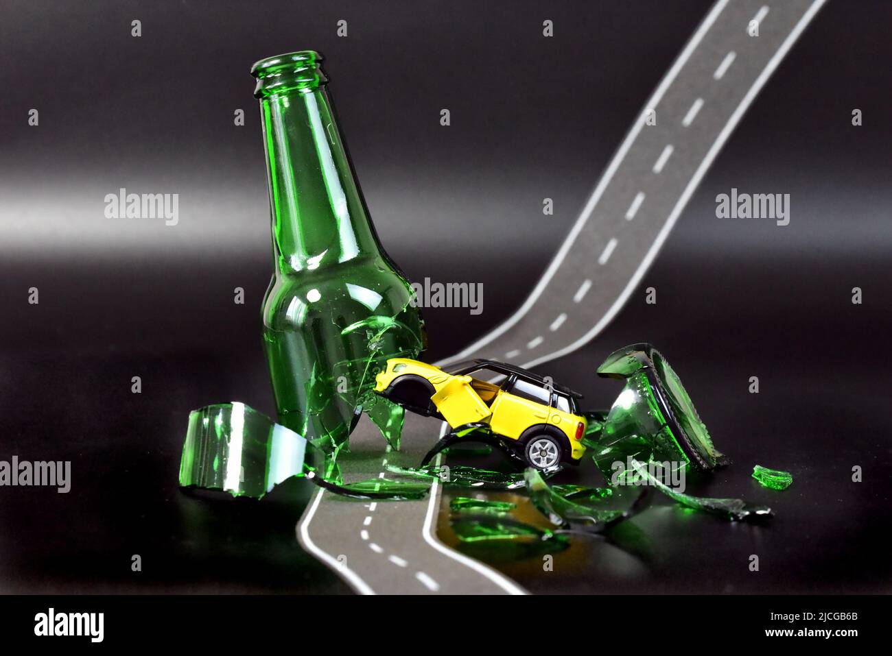 toy car accident with broken glass bottle Stock Photo