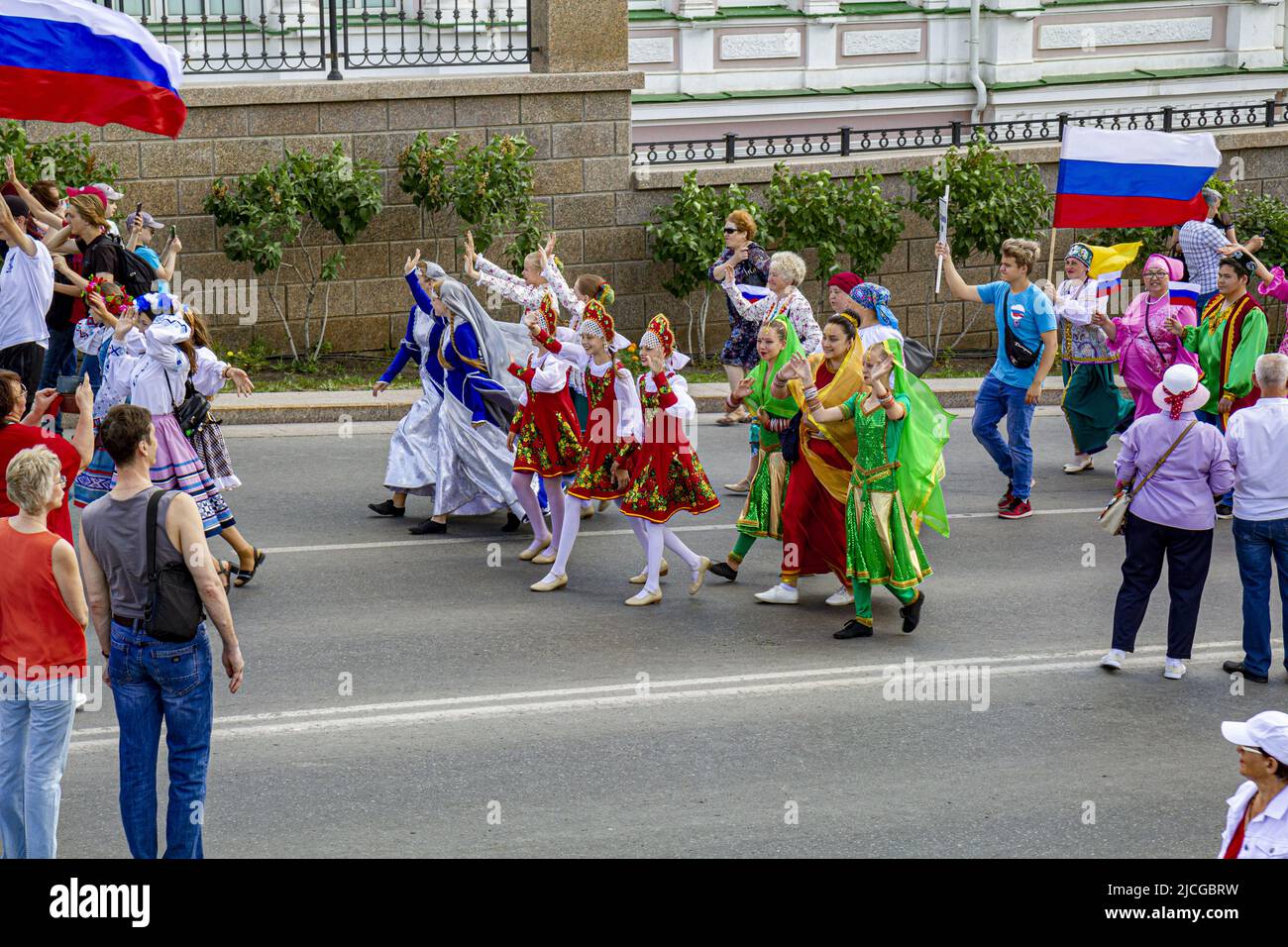 Omsk, Russia. June 12, 2022. Russia Day. Multinational group of girls participating in the festive parade. Stock Photo