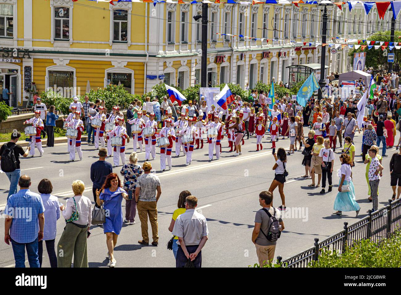 Omsk, Russia. June 12, 2022. Russia Day. A festive parade led by a group of drummer girls. Stock Photo