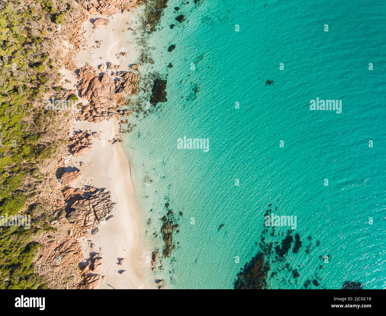 Clear turquoise waters of the rocky coast of Meelup Beach, Dunsborough Western Australia Stock Photo