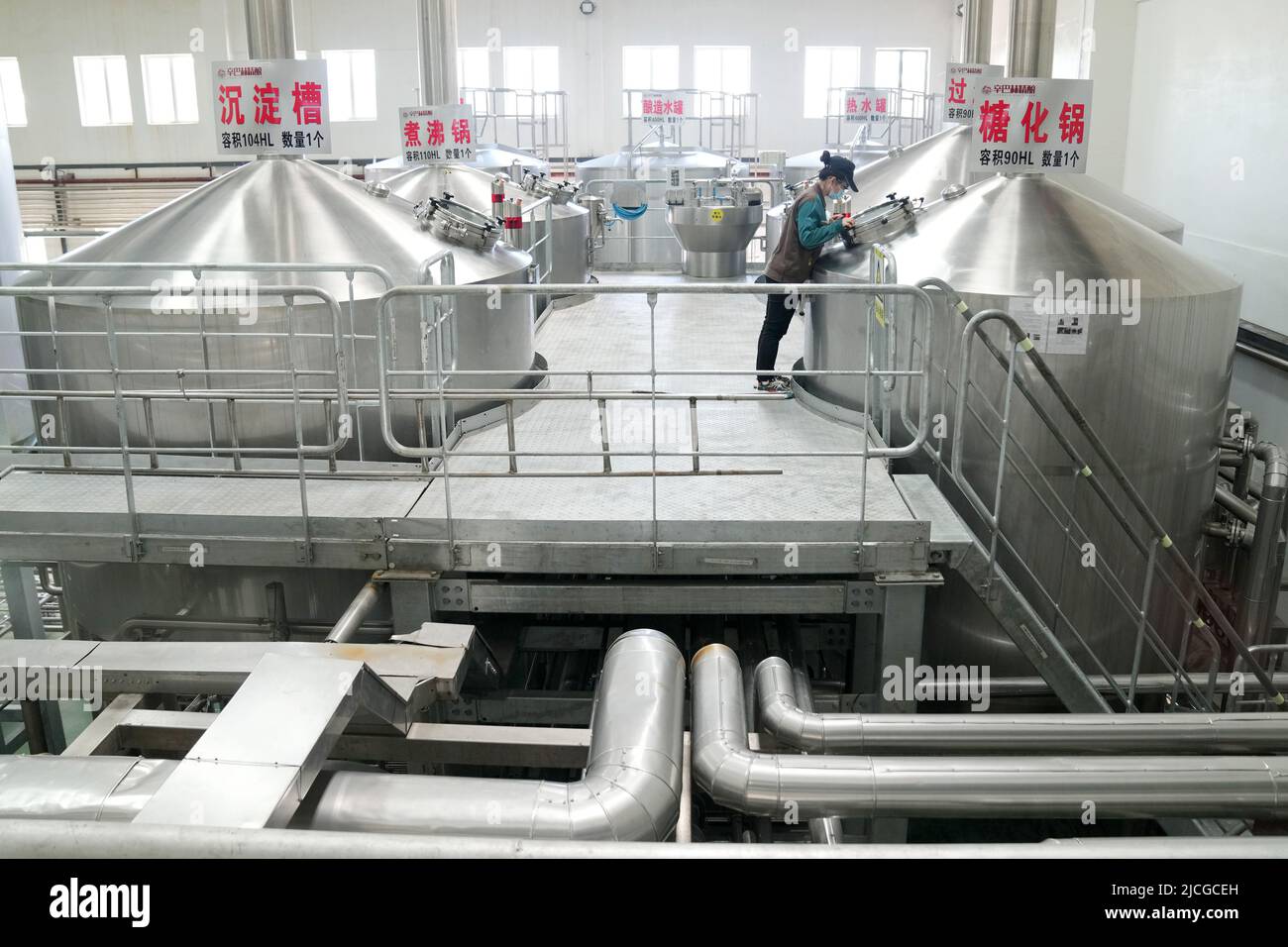Harbin. 8th June, 2022. A staff member works at a beer company at Suifenhe Area of China (Heilongjiang) Pilot Free Trade Zone, June 8, 2022. Credit: Wang Jianwei/Xinhua/Alamy Live News Stock Photo