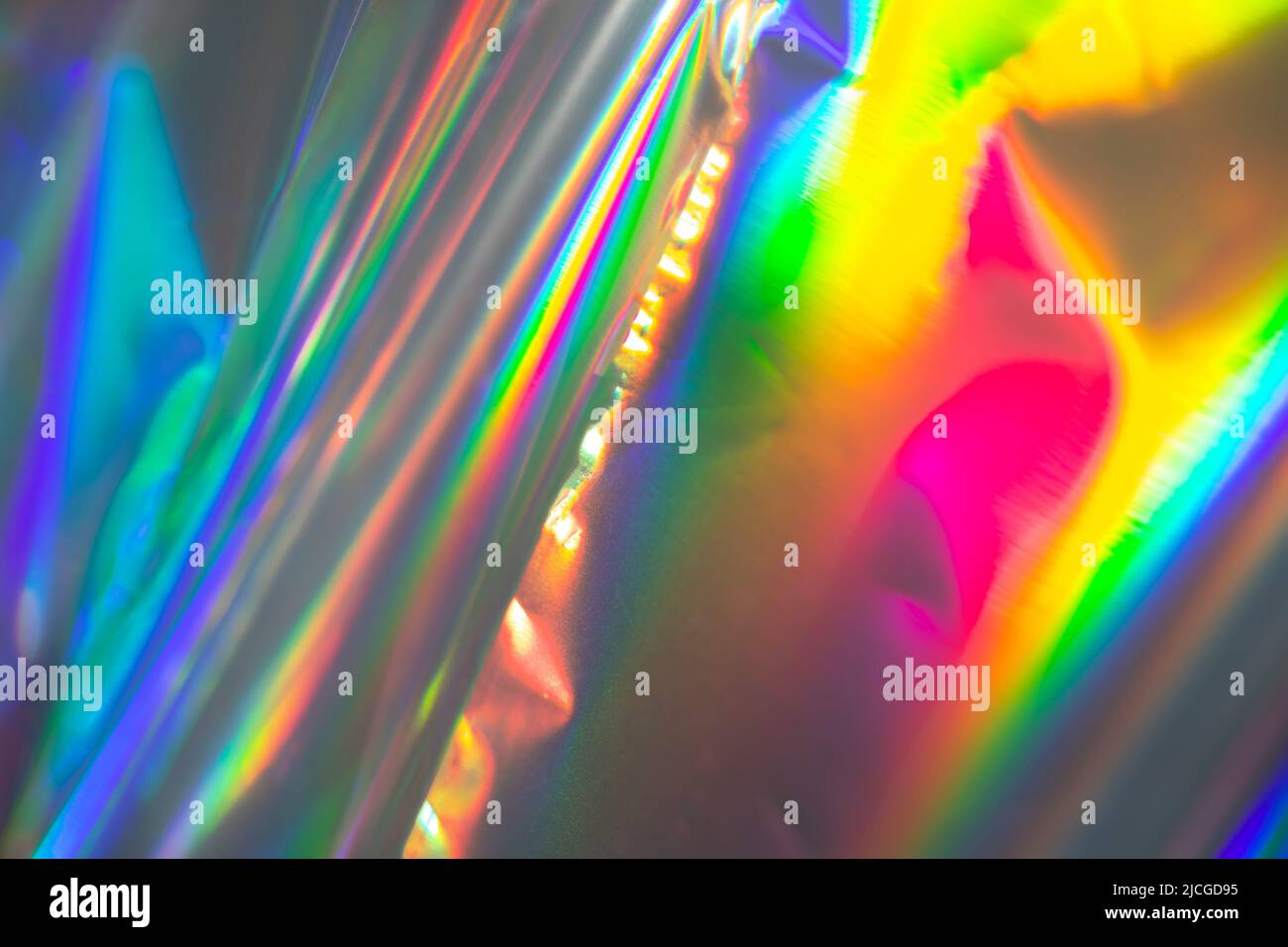 Rainbow holographic bokeh background. Multicolored overflows of color. Stock Photo