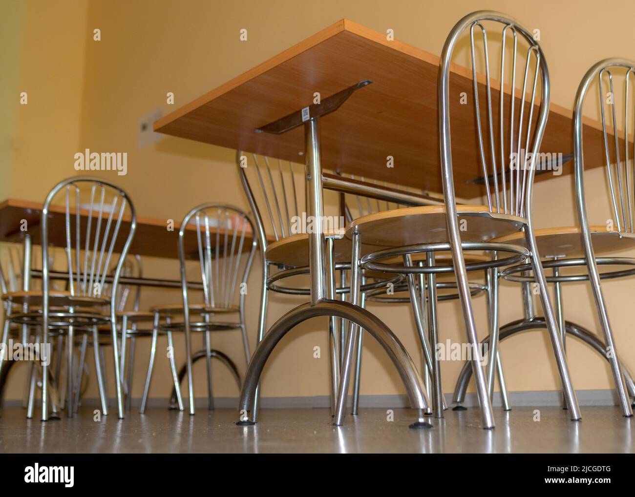 school kitchen canteen, metal table and chair legs, canteen equipment, catering establishment