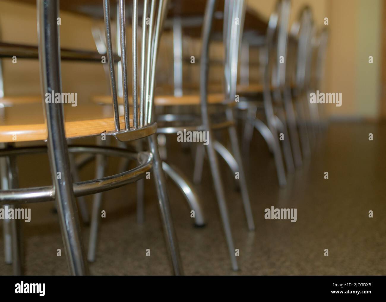 school kitchen canteen, metal table and chair legs, canteen equipment, catering establishment