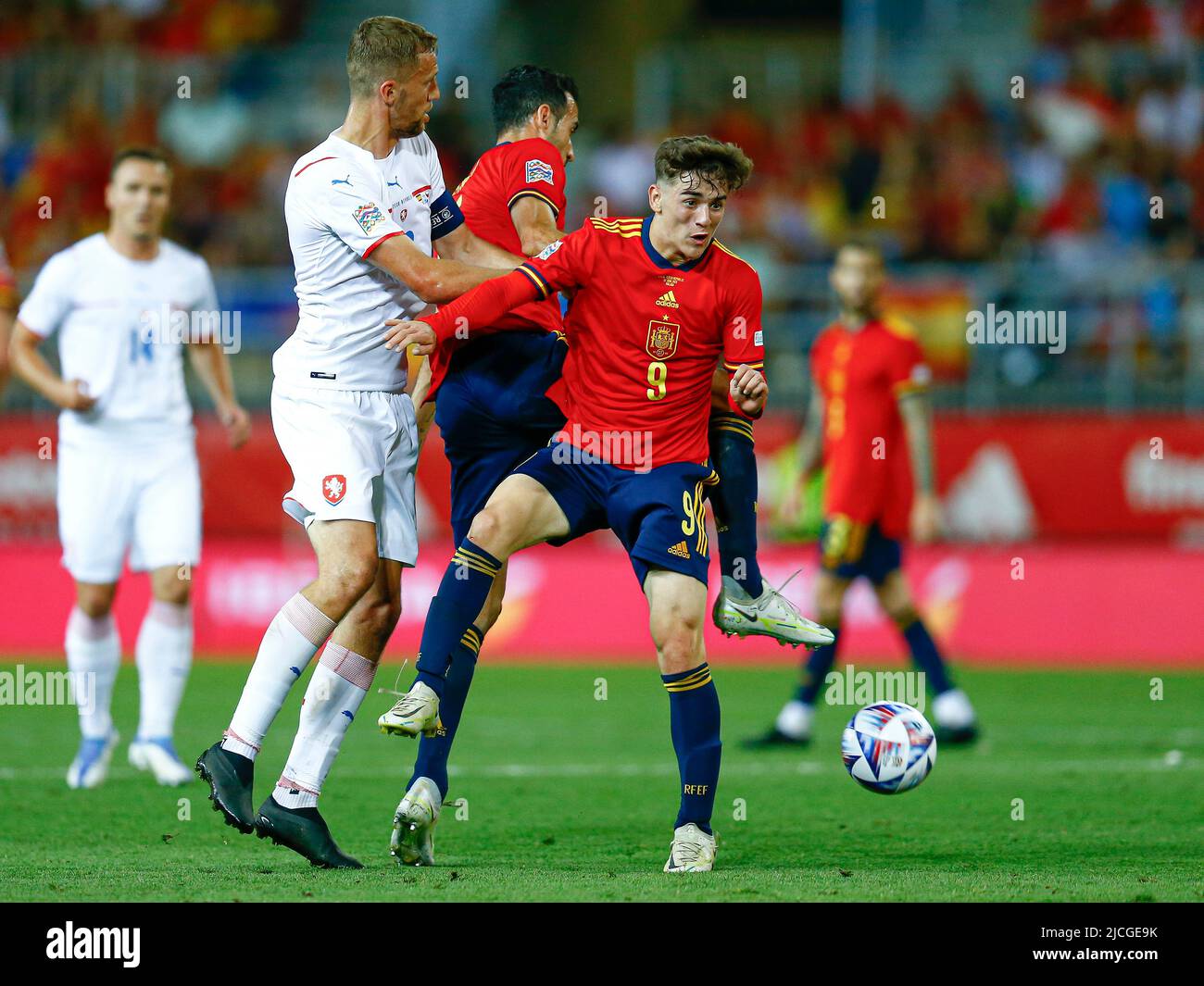Pablo Martin Paez Gavira Gavi and Sergio Busquets of Spain and Tomas Soucek of Czech Republic during the UEFA Nations League match between Spain and Czech Republic played at La Rosaleda Stadium on June 12, 2022 in Malaga, Spain. (Photo by Antonio Pozo / PRESSINPHOTO) Stock Photo