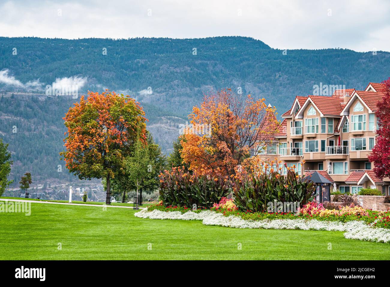 Luxury residential area with green lawn in front Stock Photo - Alamy
