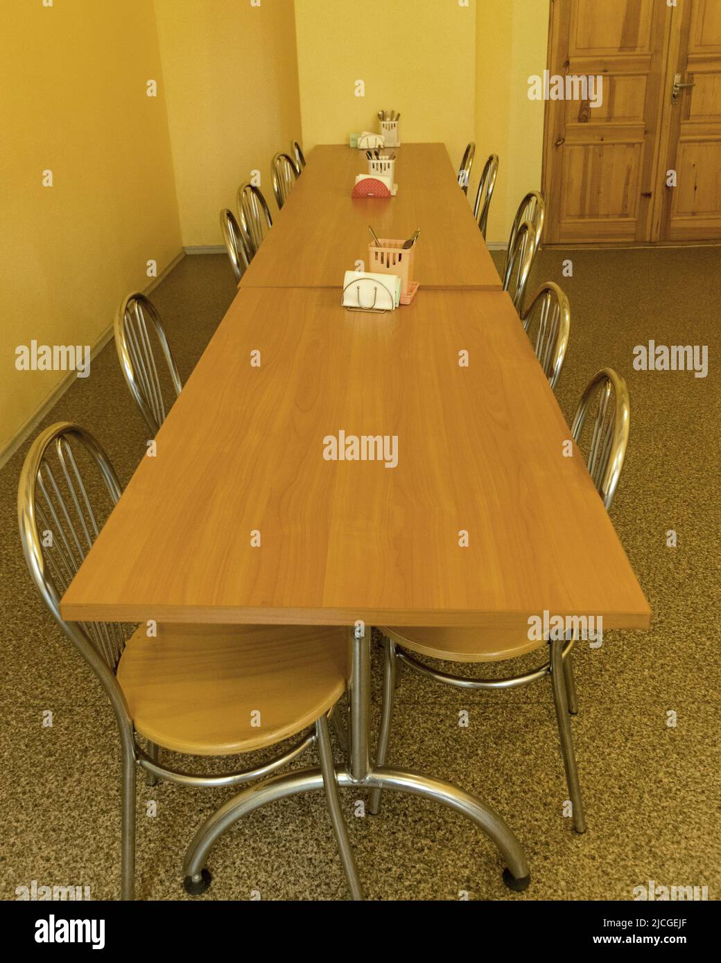 school kitchen canteen, metal table and chair legs, canteen equipment, catering establishment