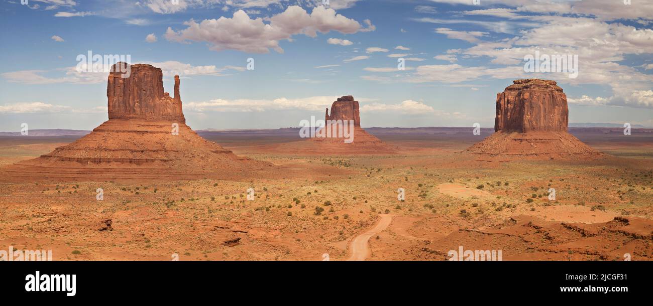 Panorama of the Mittens and Merrick Butte in Monument Valley, Arizona, United States. Stock Photo