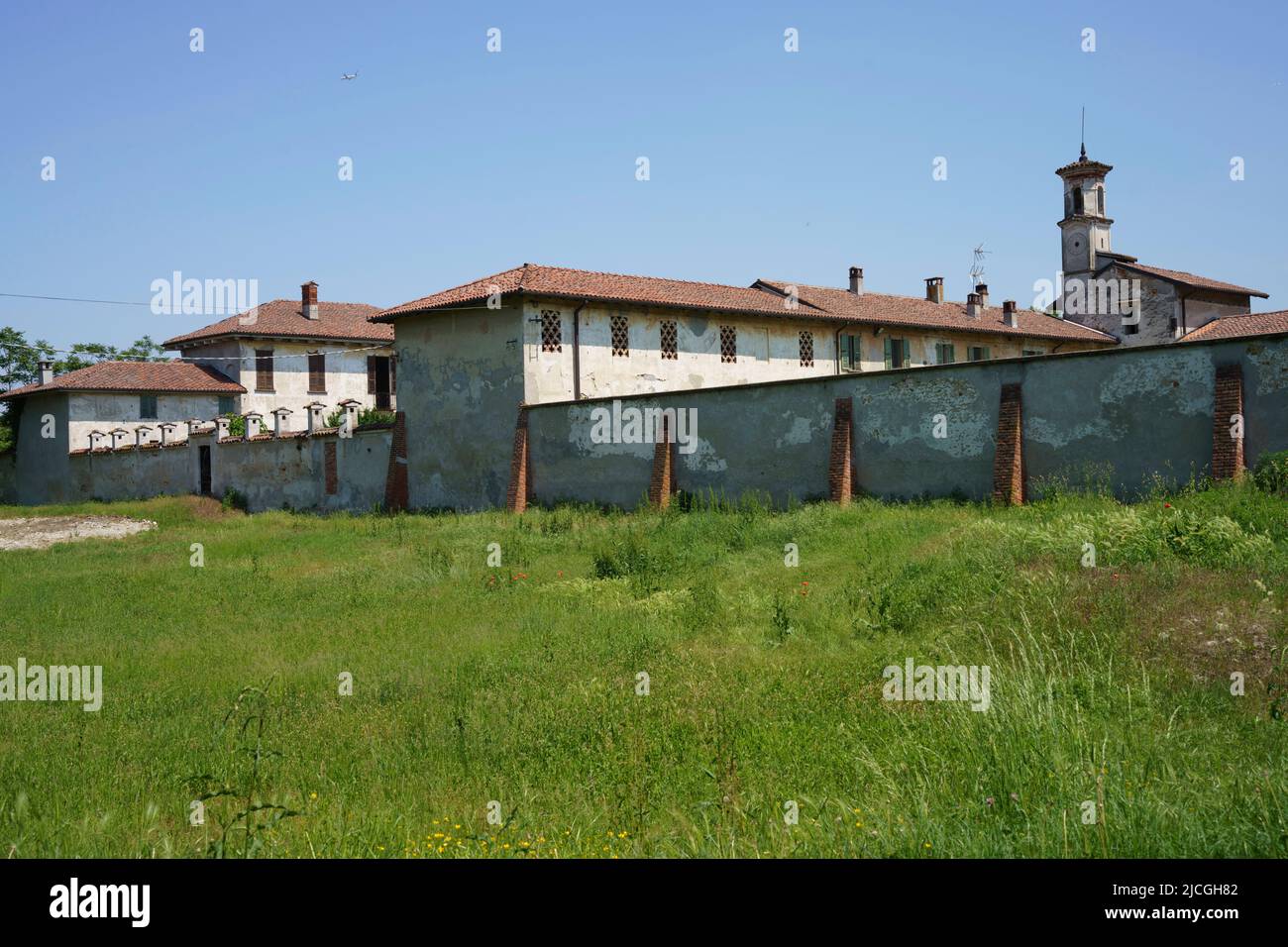 Exterior of historic farm near Galliate, in Novara province, Piedmont, Italy, at springtime Stock Photo