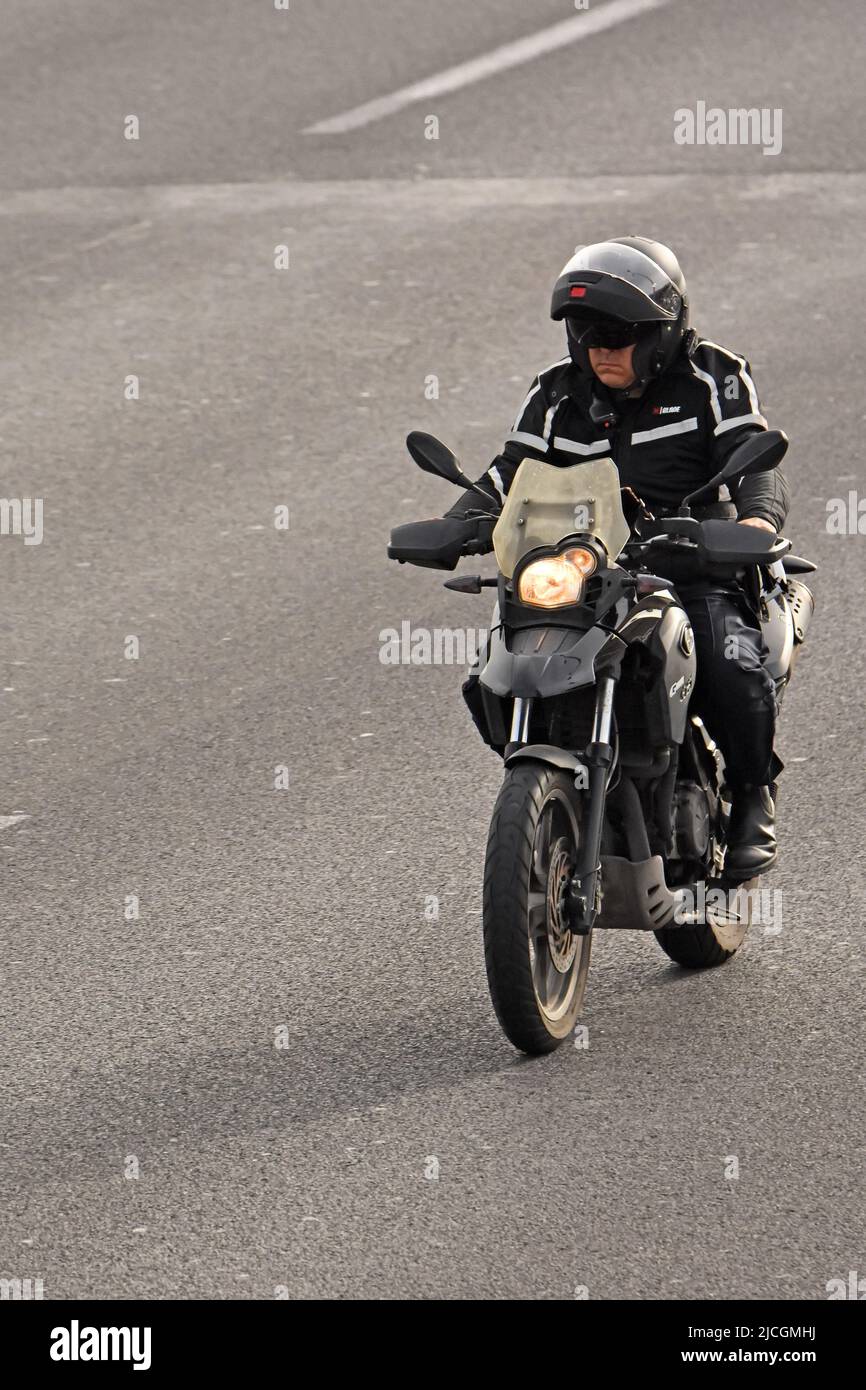 Motorcyclist on the road Stock Photo
