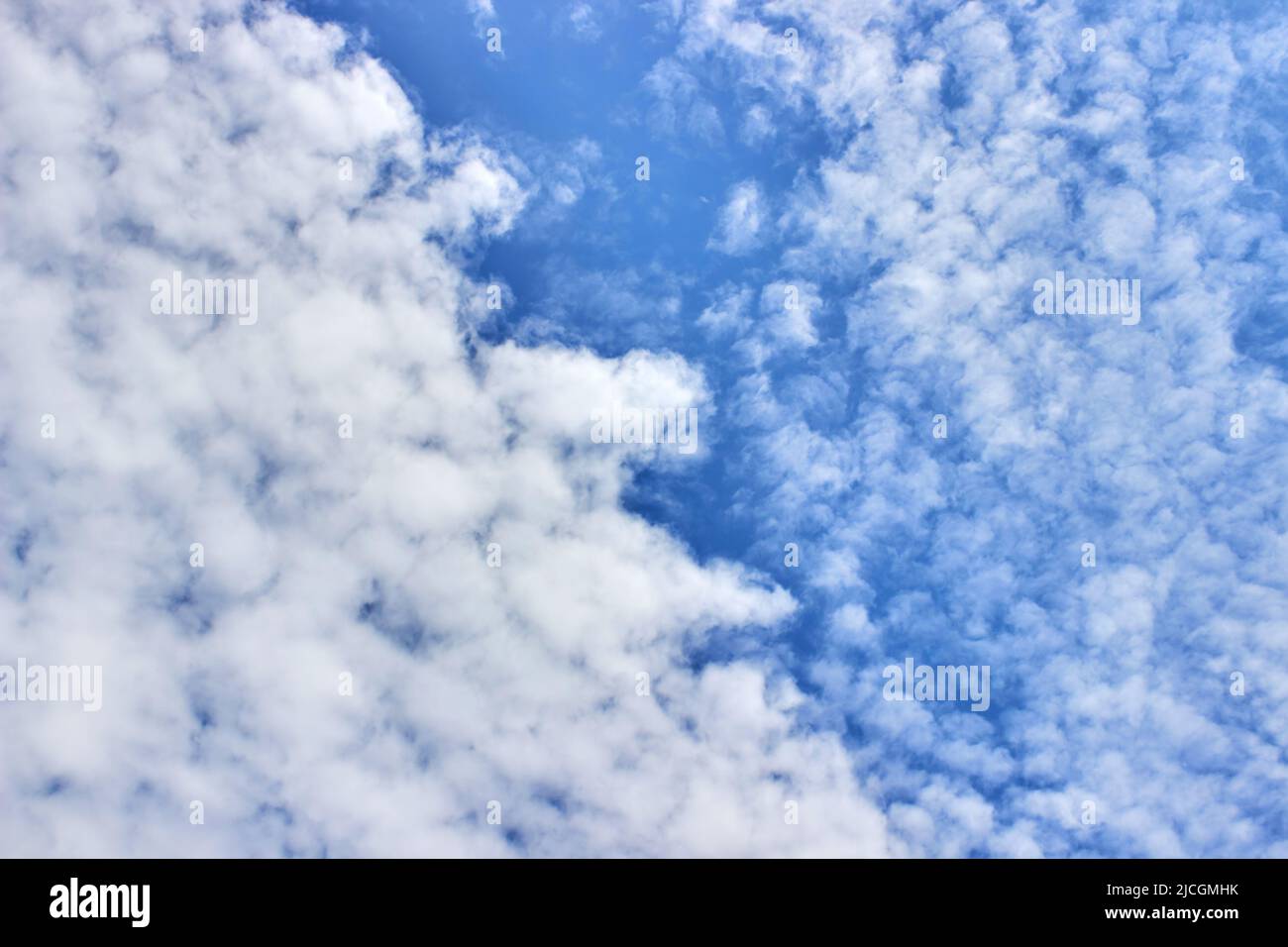 Blue sky with beautiful white clouds on a sunny day Stock Photo - Alamy