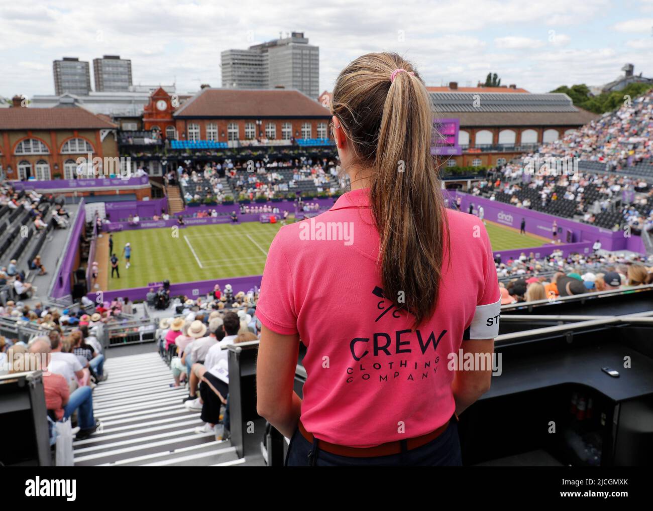 Queen's Club, West Kensington, London, England; 13th June 2022; Cinch Queens  Club ATP Tour 500 series Lawn Tennis tournament; Queens Club Crew observing  the spectators from the stands during the first match