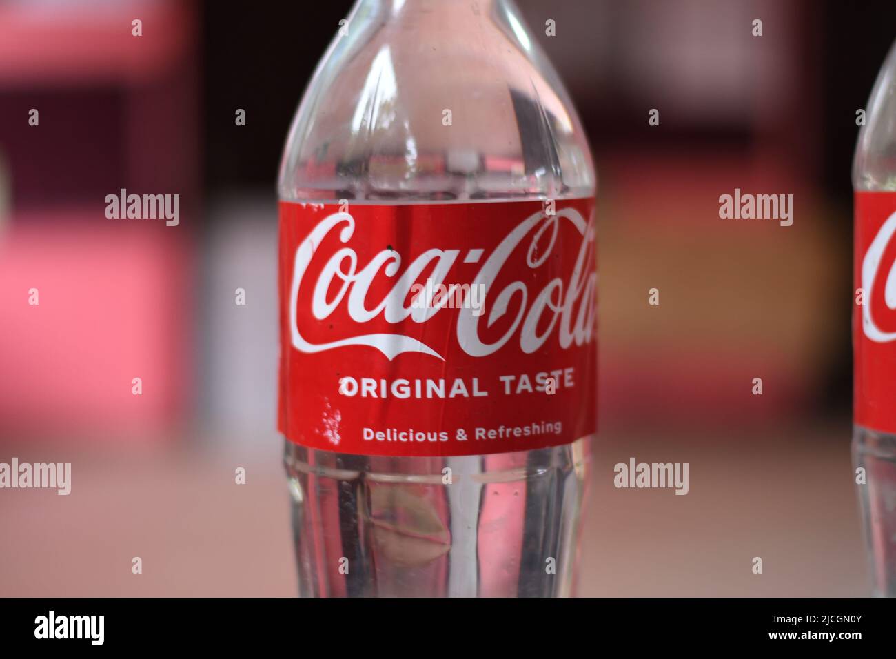 https://c8.alamy.com/comp/2JCGN0Y/plastic-bottles-of-original-white-coca-cola-soft-drink-most-popular-drink-in-the-world-2JCGN0Y.jpg