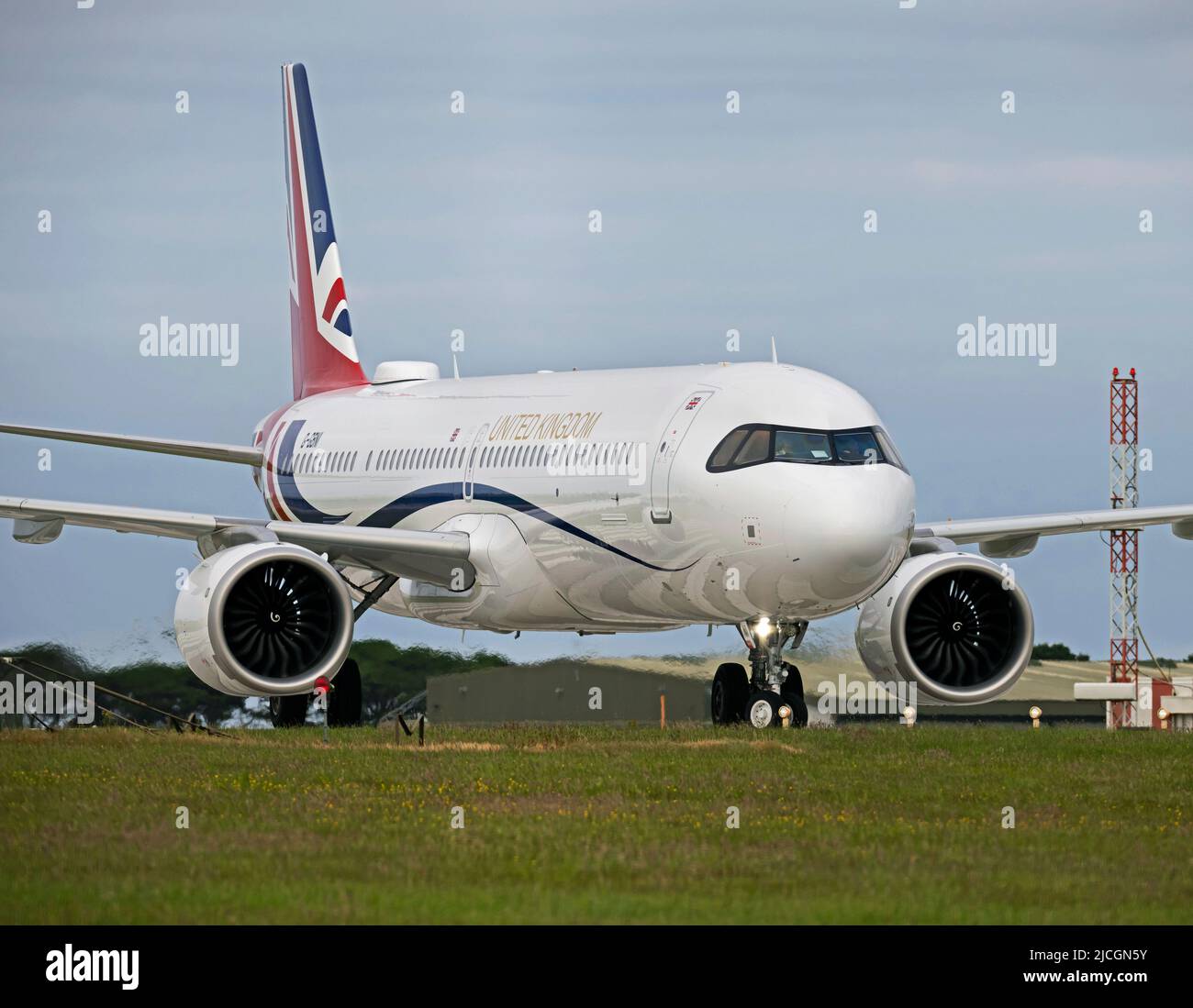 Prime Minister Boris Johnson's transport, an Airbus A321, G-GBNI, arrives at RNAS Culdrose near Helston to collect the Prime Minister after a visit to Southwest Cornwall on 13th April 2022 Stock Photo