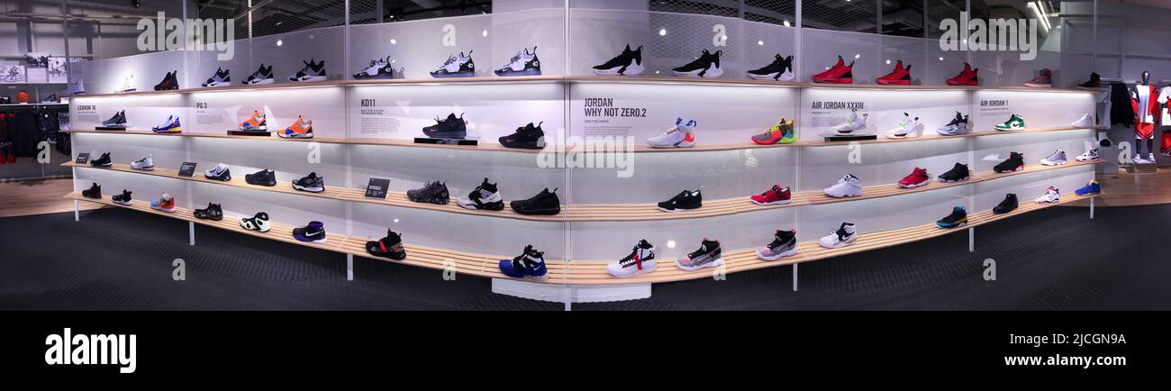 nike chicago store display rack panoramic view of shoe cabinet high end  sneakers nike outlet store jordans Stock Photo - Alamy
