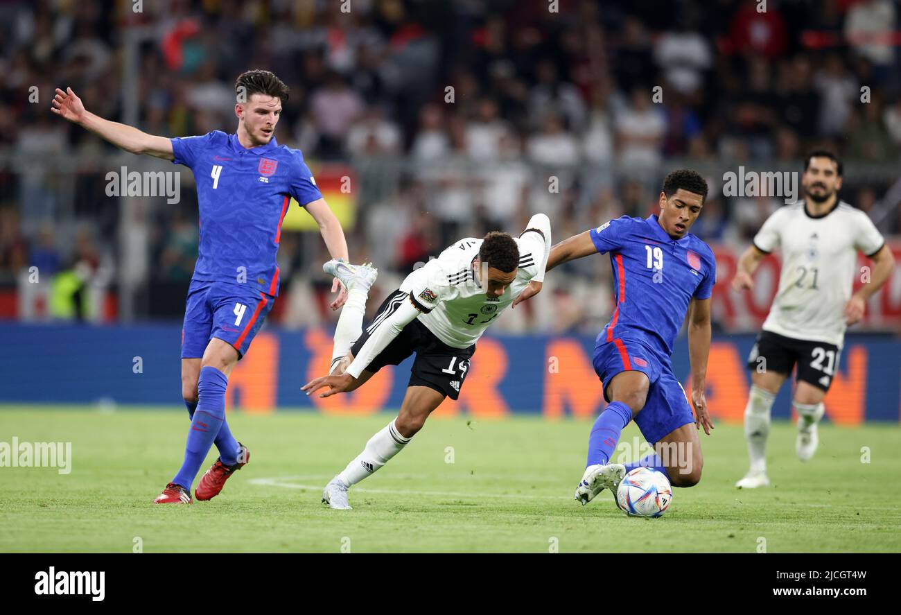 Declan Rice of England Jamal Musiala of germany  Jude Bellingham of England  MUNICH, GERMANY - JUNE 07:  UEFA Nations League League A Group 3 match between Germany and England at Allianz Arena on June 07, 2022 in Munich, Germany. Nations League Deutschland England  © diebilderwelt / Alamy Stock Stock Photo